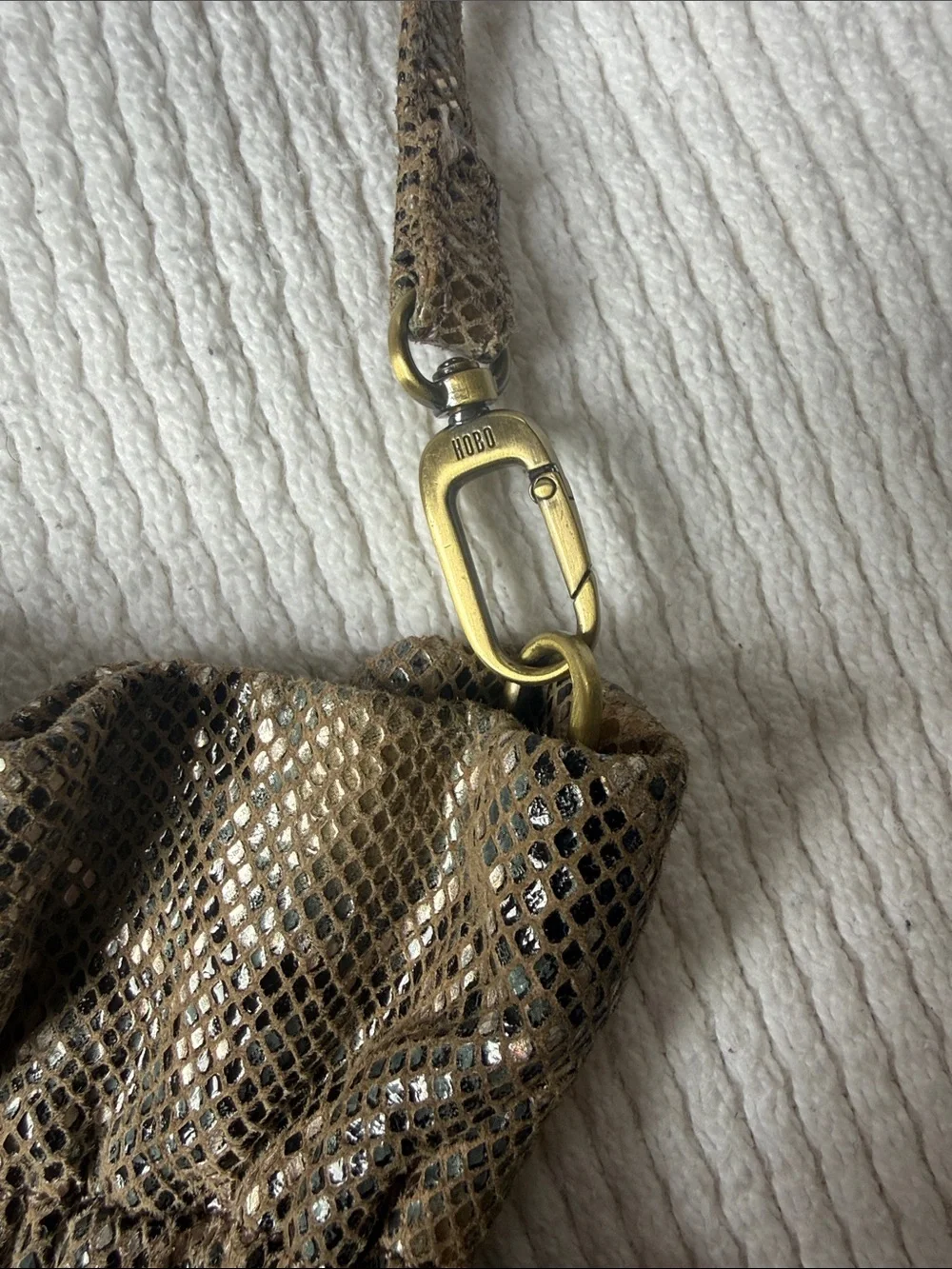 HOBO Brown Metallic Drawstring Shoulder Bag with Gold Accents